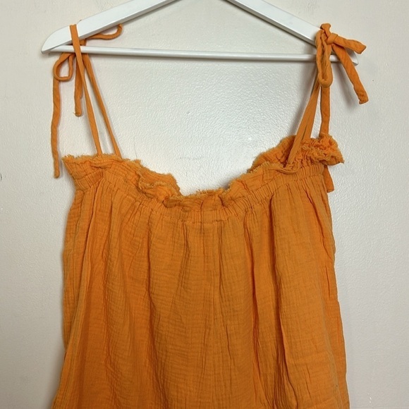 Lush Crinkle Orange Ruffle Cutout Front Tie Strap Oversized Short Romper - Picture 11 of 12